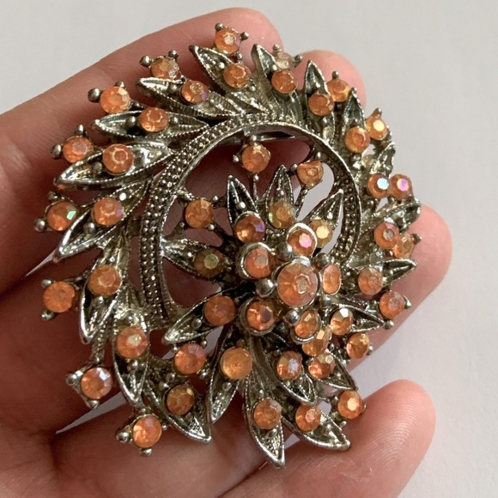 🦖5 for $25 | Vintage silver tone floral brooch with orange rhinestones